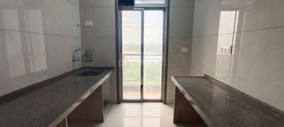 Kitchen Image of 820 Sq.ft 2 BHK Apartment / Flat for rent in Mangeshi Dhara, Thakurli Thane for Rs. 22000