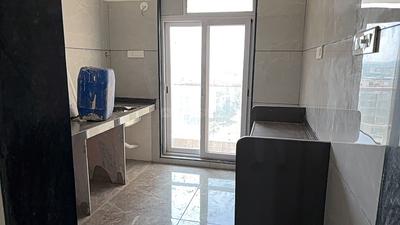 Kitchen Image of 1300 Sq.ft 2 BHK Apartment / Flat for rent in Shreenathji Delta Riviera, Ulwe Navi Mumbai for Rs. 55000