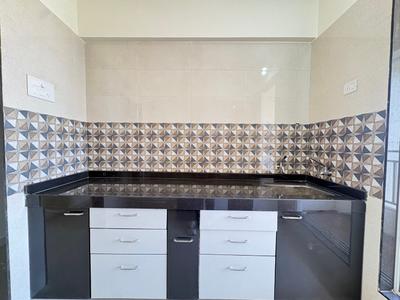 Kitchen Image of 895 Sq.ft 2 BHK Apartment / Flat for sale in Shree Uma Heights, Dombivli East Thane for Rs. 5370000