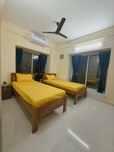 Bedroom Image of HelloWorld Pride Stay in New Town, Kolkata