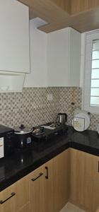 Kitchen Image of 700 Sq.ft 2 BHK Apartment / Flat for rent in Urbanrise Revolution One, Padur Chennai for Rs. 28000