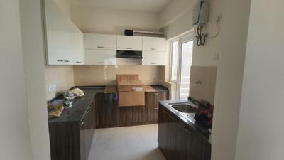 Kitchen Image of 1090 Sq.ft 2 BHK Apartment / Flat for rent in Assotech Blith, Gopalpur Gurgaon for Rs. 33000
