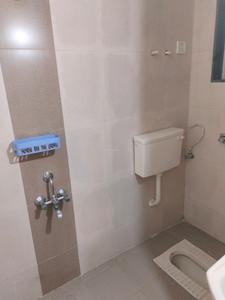 Common Bathroom Image of 1015 Sq.ft 2 BHK Apartment / Flat for sale in Paradise Sai Harmony, Ulwe Navi Mumbai for Rs. 9000000