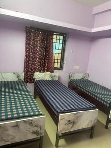 Bedroom Image of Lucky living pg for gents in Navalur, Chennai