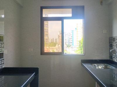 Kitchen Image of 582 Sq.ft 1 BHK Apartment / Flat for sale in Tharwani Vedant Millenia, Titwala Thane for Rs. 2550000
