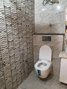 Common Bathroom Image of 1150 Sq.ft 2 BHK Builder Floor for sale in RK Traders Qutab Heights, DLF Phase 4 Gurgaon for Rs. 6900000
