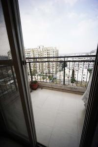 Balcony Image of 884 Sq.ft 2 BHK Apartment / Flat for sale in Moshi Pune for Rs. 5500000