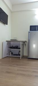 Kitchen Image of 400 Sq.ft 1 RK Apartment / Flat for rent in Domlur Layout Bengaluru for Rs. 23000