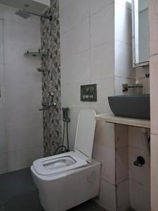 Common Bathroom Image of 1410 Sq.ft 3 BHK Apartment / Flat for sale in Paras Tierea, Sector 137 Noida for Rs. 12700000