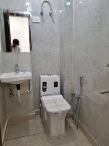 Common Bathroom Image of 600 Sq.ft 2 BHK Apartment / Flat for sale in Dwarka Mor New Delhi for Rs. 4000000