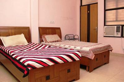 Bedroom Image of ROOMSOOM PG in Sector 125, Noida