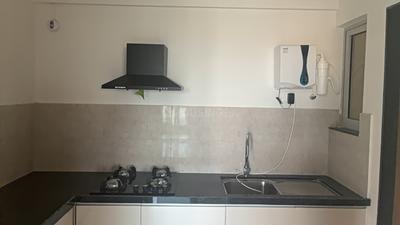 Kitchen Image of 880 Sq.ft 2 BHK Apartment / Flat for rent in Geras Planet Of Joy, Upper Kharadi Pune for Rs. 32000