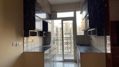 Kitchen Image of 900 Sq.ft 2 BHK Apartment / Flat for sale in Signature Global Grand IVA, Sector 103 Gurgaon for Rs. 6850000