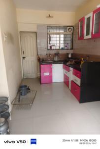 Kitchen Image of 1000 Sq.ft 2 BHK Apartment / Flat for rent in Vardhaman Heights Phase2, Rahatani Pune for Rs. 25500