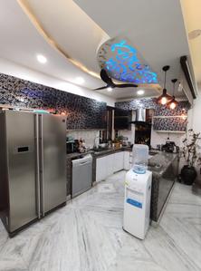Kitchen Image of 910 Sq.ft 3 BHK Apartment / Flat for sale in Janakpuri New Delhi for Rs. 13000000