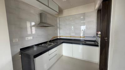 Kitchen Image of 1251 Sq.ft 2 BHK Apartment / Flat for sale in Ajmera And Sheetal Casa Vyoma, Vastrapur Ahmedabad for Rs. 12000000