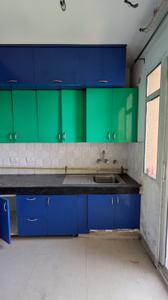 Kitchen Image of 950 Sq.ft 2 BHK Apartment / Flat for sale in Aditya City Apartment Ghaziabad, Wave City Ghaziabad for Rs. 6200000