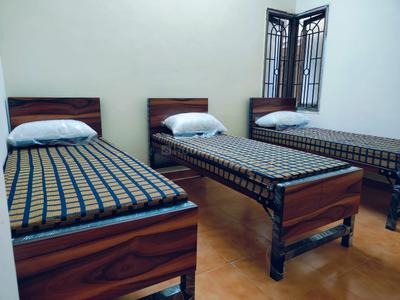 Bedroom Image of New sri sai Deluxe gents pg in Koramangala, Bengaluru