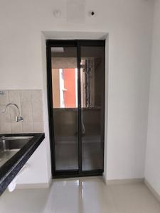 Kitchen Image of 950 Sq.ft 3 BHK Apartment / Flat for rent in Shapoorji Pallonji Joyville Hinjawadi I Phase 1, Bhoirwadi Pune for Rs. 35000