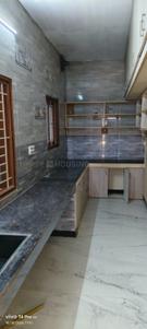 Kitchen Image of 1100 Sq.ft 2 BHK Builder Floor for rent in Mummoorthi Nagar Tiruppur for Rs. 13000