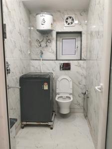 Common Bathroom Image of 367 Sq.ft 1 RK Apartment / Flat for rent in DLF Capital Greens, Karampura New Delhi for Rs. 25000