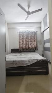 Bedroom Image of 595 Sq.ft 1 BHK Apartment / Flat for rent in Poddar Palm Enclave, Makarba Ahmedabad for Rs. 22000