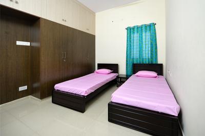 Bedroom Image of Guru Krupa Nilayam in Kukatpally, Hyderabad