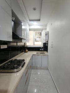 Kitchen Image of 1200 Sq.ft 2 BHK Apartment / Flat for rent in MRG Altura V, Mohanpura Jaipur for Rs. 26000