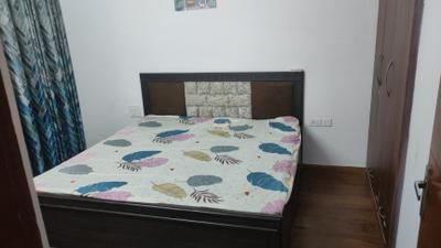Bedroom Image of 1085 Sq.ft 2 BHK Apartment / Flat for sale in Nimbus The Golden Palms, Sector 168 Noida for Rs. 12600000