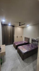 Bedroom Image of Girls pg in Sector 57, Gurgaon