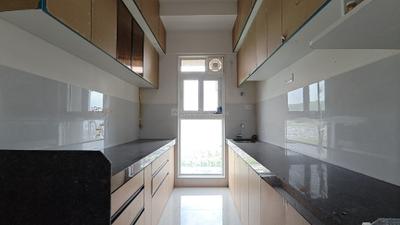 Kitchen Image of 850 Sq.ft 2 BHK Apartment / Flat for rent in Ashar Arize, Kalwa Thane for Rs. 35000