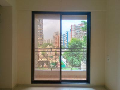 Living Room Image of 650 Sq.ft 1 BHK Apartment / Flat for sale in Tharwani Vedant Nakshatra Wing K Phase V, Badlapur West Badlapur for Rs. 2800000