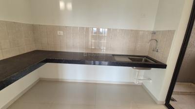 Kitchen Image of 1025 Sq.ft 2 BHK Apartment / Flat for rent in Shapoorji Pallonji Joyville Sensorium, Maan Pune for Rs. 26500