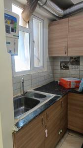 Kitchen Image of 1075 Sq.ft 2 BHK Apartment / Flat for sale in Gaur City 7th Avenue, Noida Extension Greater Noida for Rs. 8500000
