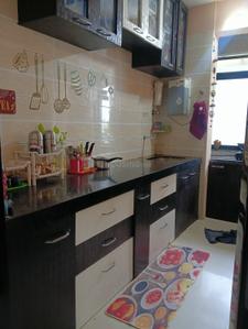 Kitchen Image of 865 Sq.ft 2 BHK Apartment / Flat for sale in Tharwani Ritu World, Badlapur West Badlapur for Rs. 3500000