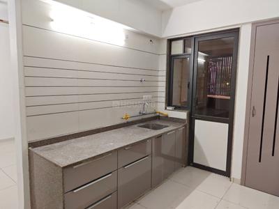 Kitchen Image of 749 Sq.ft 2 BHK Apartment / Flat for rent in Shrikunj Sky, Sola Ahmedabad for Rs. 35000