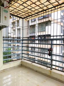 Bedroom Two Image of 900 Sq.ft 2 BHK Apartment / Flat for sale in Happy Home Sarvoday Swaroop, Dombivli East Thane for Rs. 6900000