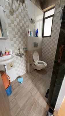 Bathroom Image of 700 Sq.ft 1 BHK Apartment / Flat for sale in Man Opus, Mira Road East Mira Bhayandar for Rs. 7500000