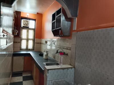 Kitchen Image of 750 Sq.ft 1 BHK Builder Floor for rent in Dwarka Mor New Delhi for Rs. 10500