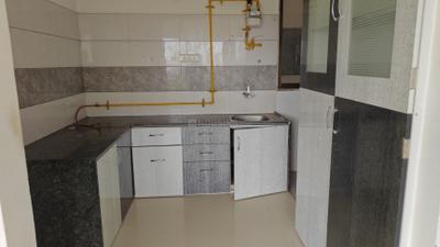 Kitchen Image of 899 Sq.ft 2 BHK Apartment / Flat for sale in Aaryan Gloria, South Bopal Ahmedabad for Rs. 5200000