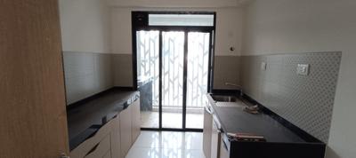 Kitchen Image of 1130 Sq.ft 3 BHK Apartment / Flat for rent in Ekta Tripolis, Goregaon West Mumbai for Rs. 115000