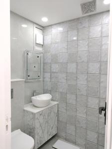 Common Bathroom Image of 1800 Sq.ft 3 BHK Apartment / Flat for sale in United Friends, Sector 6 Dwarka New Delhi for Rs. 28800000