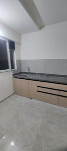 Kitchen Image of 1001 Sq.ft 2 BHK Apartment / Flat for rent in Sah Santiago Uptown, Kiwale Pune for Rs. 23000