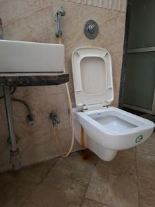 Common Bathroom Image of 660 Sq.ft 1 BHK Apartment / Flat for sale in Om Shivam Arjun, Kamothe Navi Mumbai for Rs. 7600000