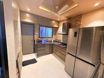 Kitchen Image of 800 Sq.ft 3 BHK Independent House for rent in Godadara Surat for Rs. 30000