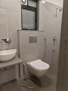 Common Bathroom Image of 650 Sq.ft 2 BHK Apartment / Flat for sale in Modirealty Ashvattha Phase 1, Dahisar East Mumbai for Rs. 14400000