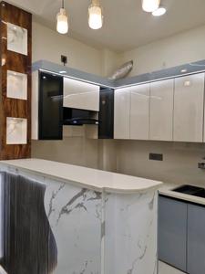 Kitchen Image of 600 Sq.ft 2 BHK Apartment / Flat for sale in Hans Luxury Floor, Nangli Sakrawati New Delhi for Rs. 3650000