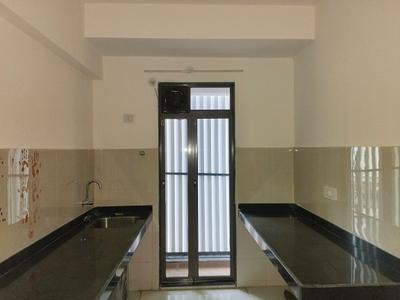Kitchen Image of 870 Sq.ft 2 BHK Apartment / Flat for rent in Runwal My City Phase II Cluster 5 Part III, Usarghar Thane for Rs. 14999