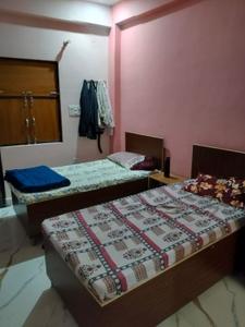 Bedroom Image of J.S LUXURY PG in Bajidpur, Noida