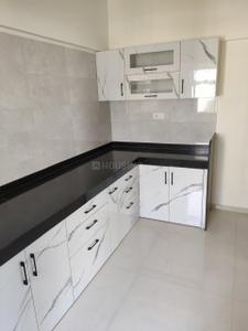 Kitchen Image of 880 Sq.ft 2 BHK Apartment / Flat for sale in Tathawade Pune for Rs. 6700000